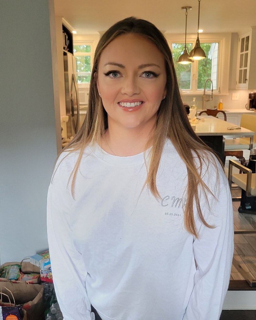 Client with long layered hair and natural glam makeup in Fairfield County